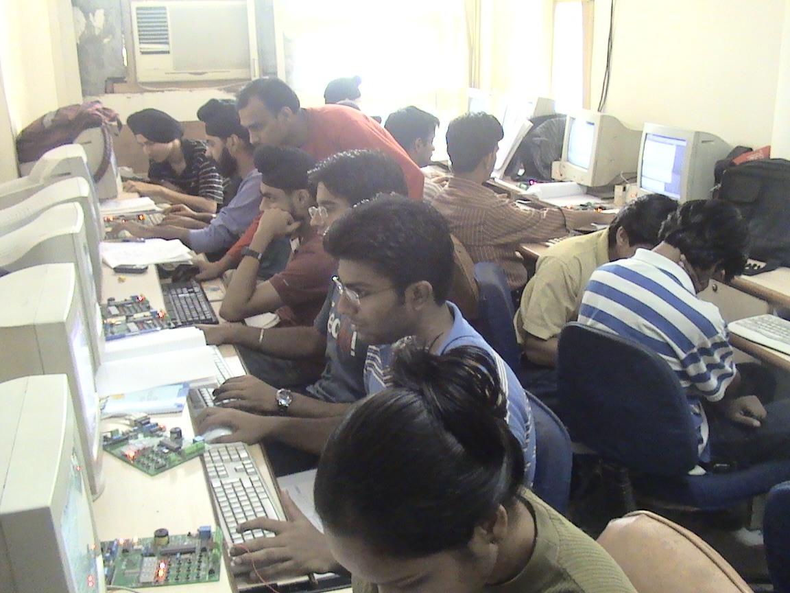 Student attending an electronics practical session