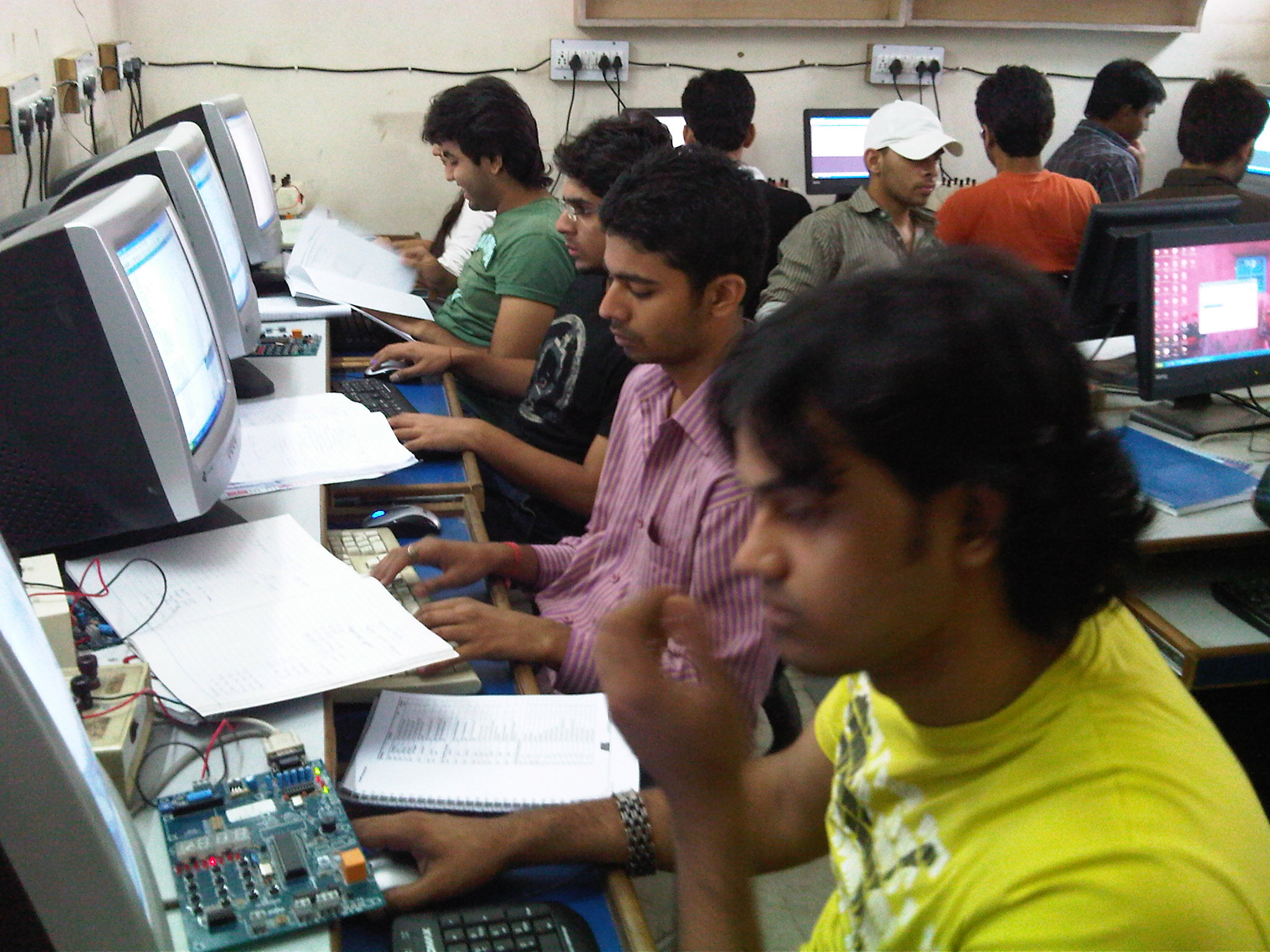 Student working with electronic hardware